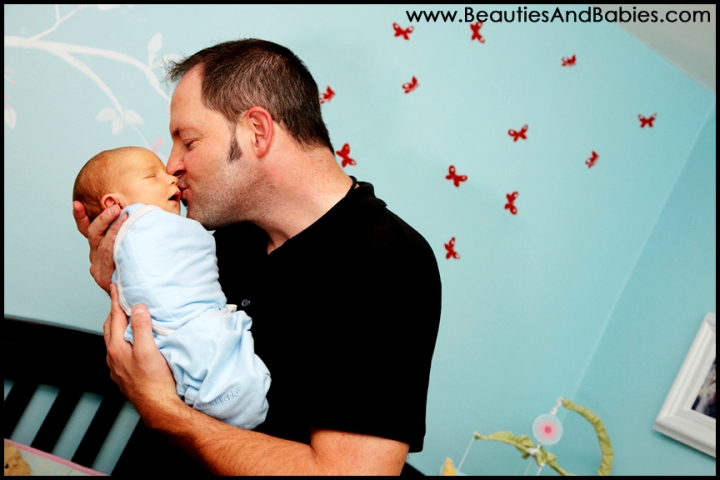sleeping newborn baby and father professional pictures Los Angeles photographer